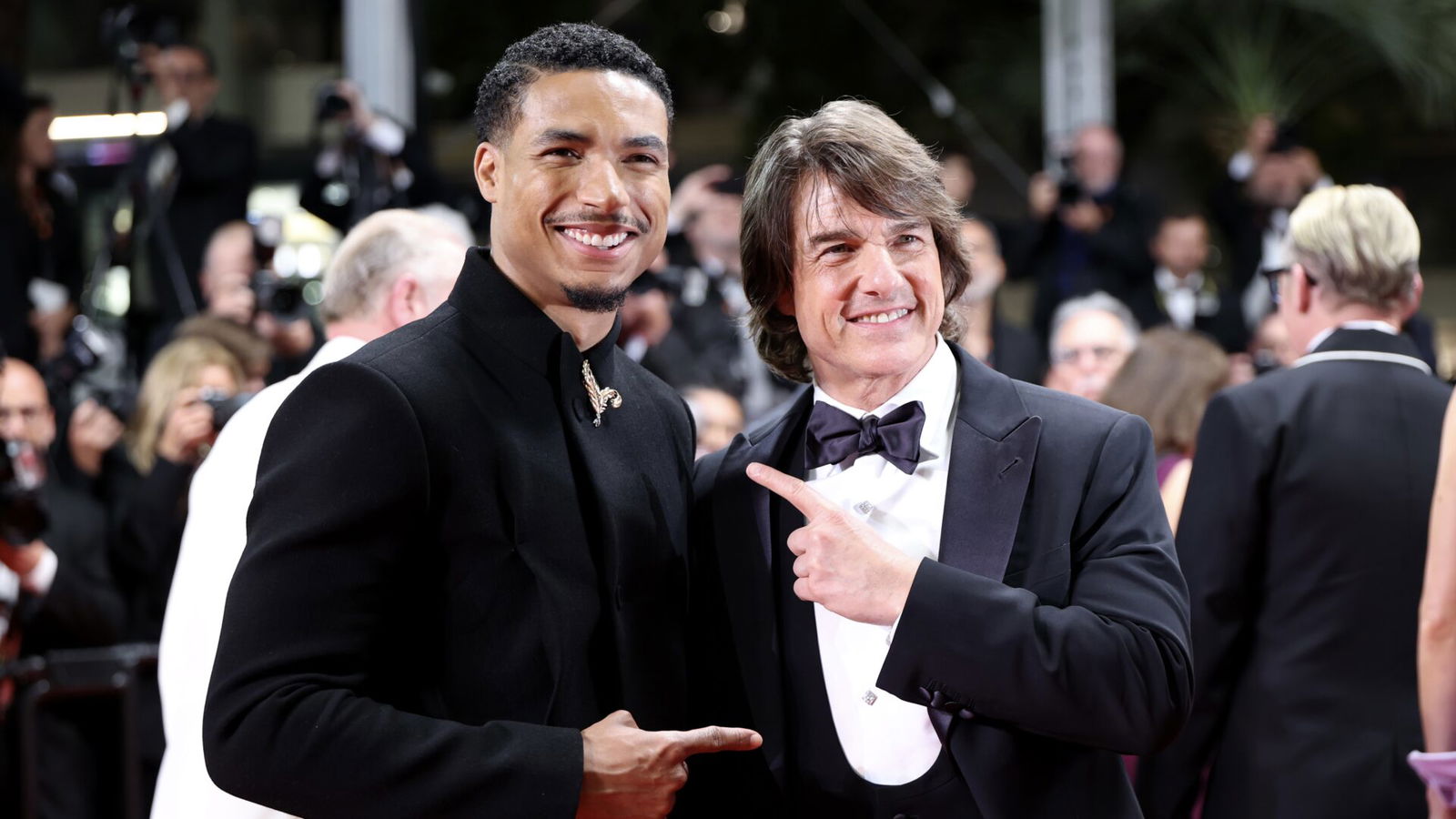 Greg Tarzan Davis and Tom Cruise-Getty Images-2215102563 Greg Tarzan Davis and Tom Cruise