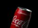 coca cola can on black background
