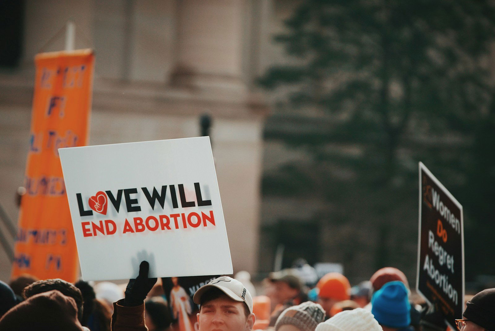 Photo by Tessa Rampersad love will end abortion sign