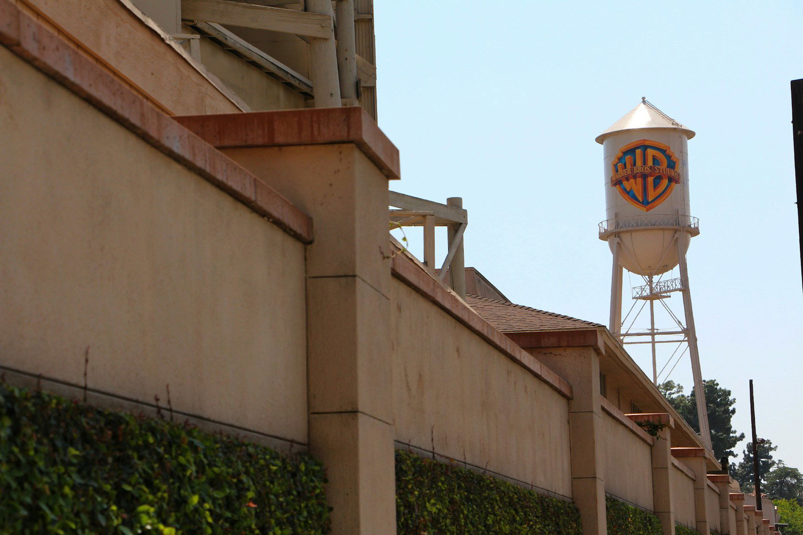 a tall water tower sitting next to a building