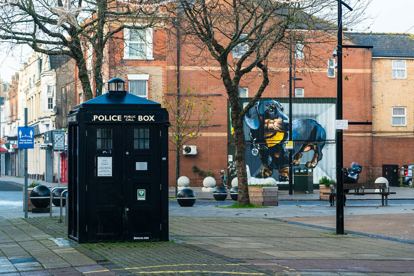 Photo by Nick Fewings black police box on sidewalk during daytime
