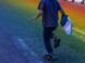 boy running through road