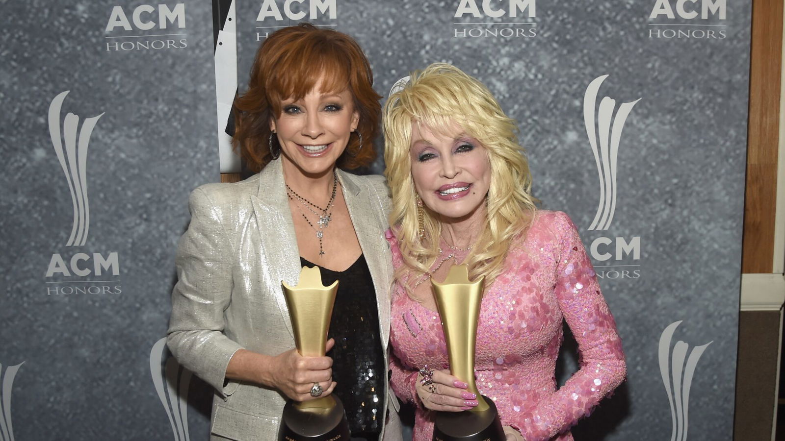 Reba McEntire and Dolly Parton-Getty Images-838077696 Reba McEntire and Dolly Parton