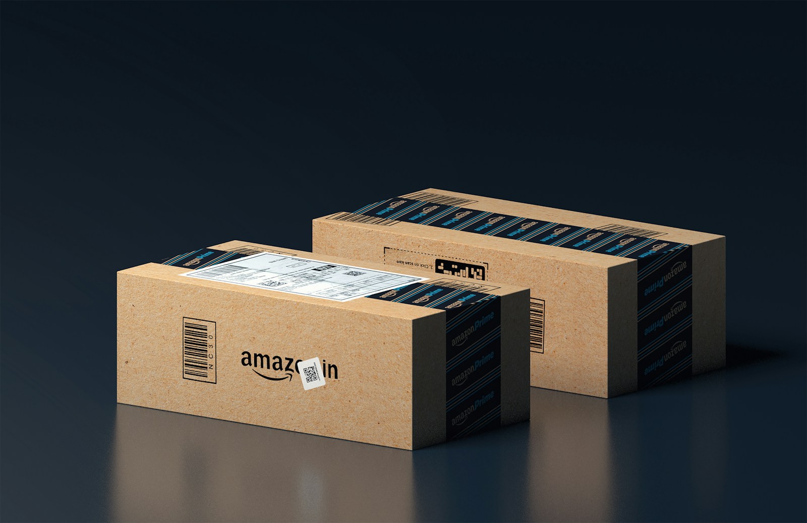Photo by Anirudh two boxes of amazon are stacked on top of each other